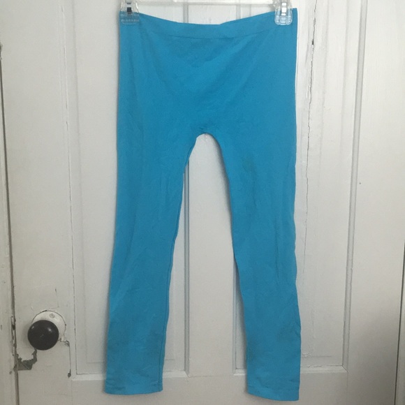 Bright blue tights go to the middle of my shin